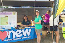 Dean Maria Gallo at NEW booth on Kaua‘i